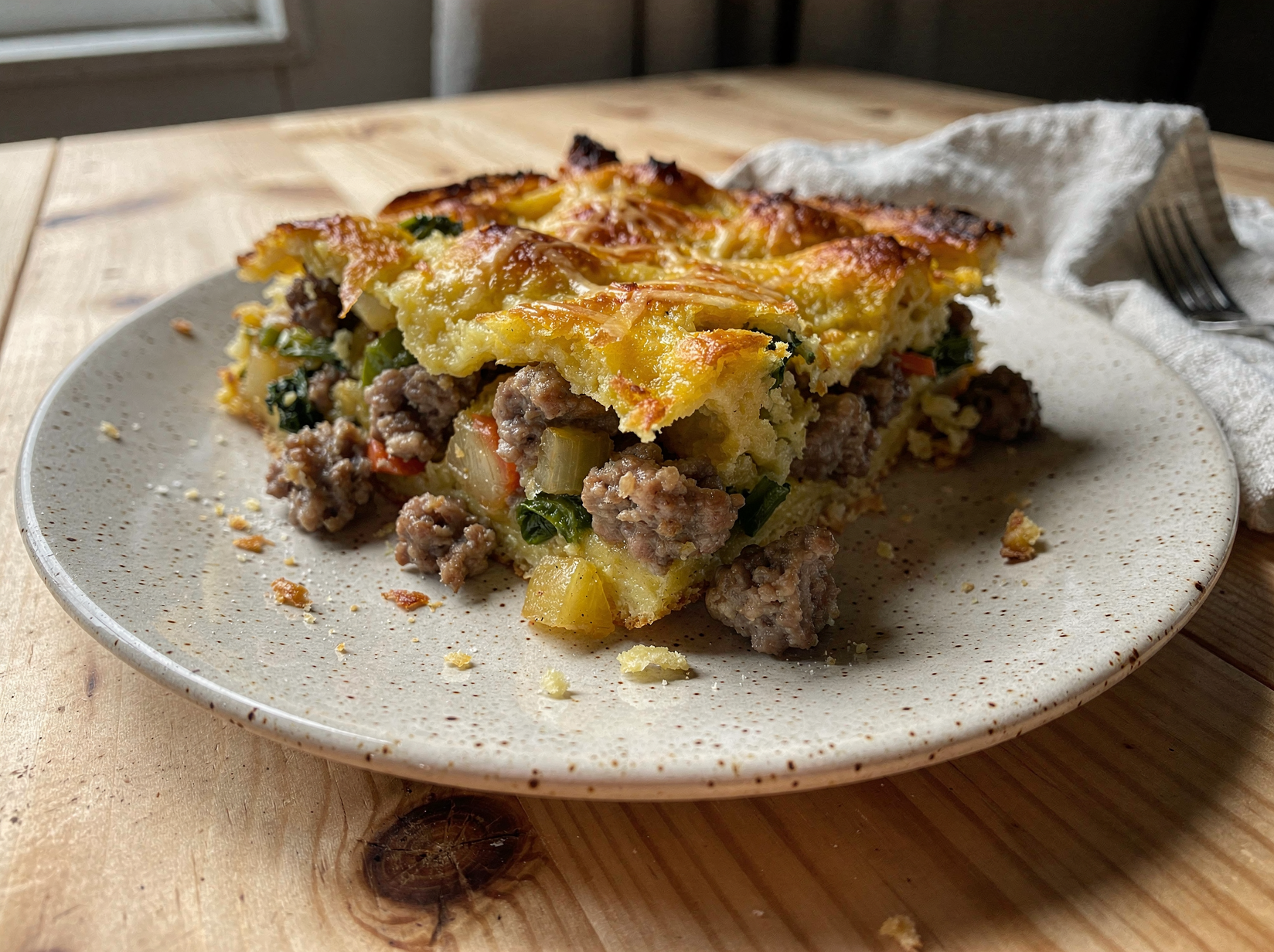 Brown the sausage and vegetables