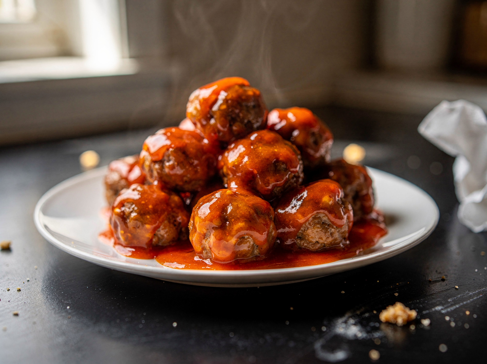Simmer the meatballs in the sauce
