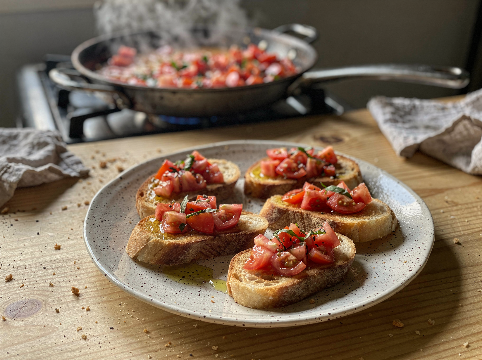 Dice and drain the tomatoes